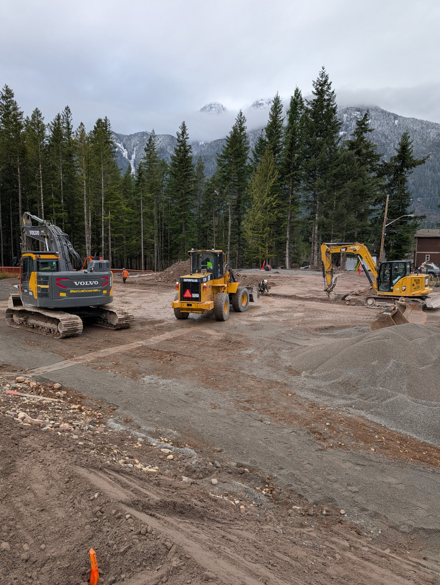 Whistler Excavations fleet on site — Volvo excavator, CAT loader, CAT mini excavator